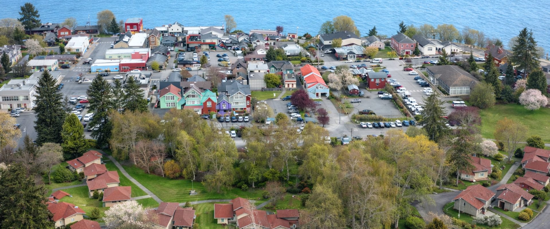 Aerial view of residential homes and neighborhoods in Langley, Washington on Whidbey Island.